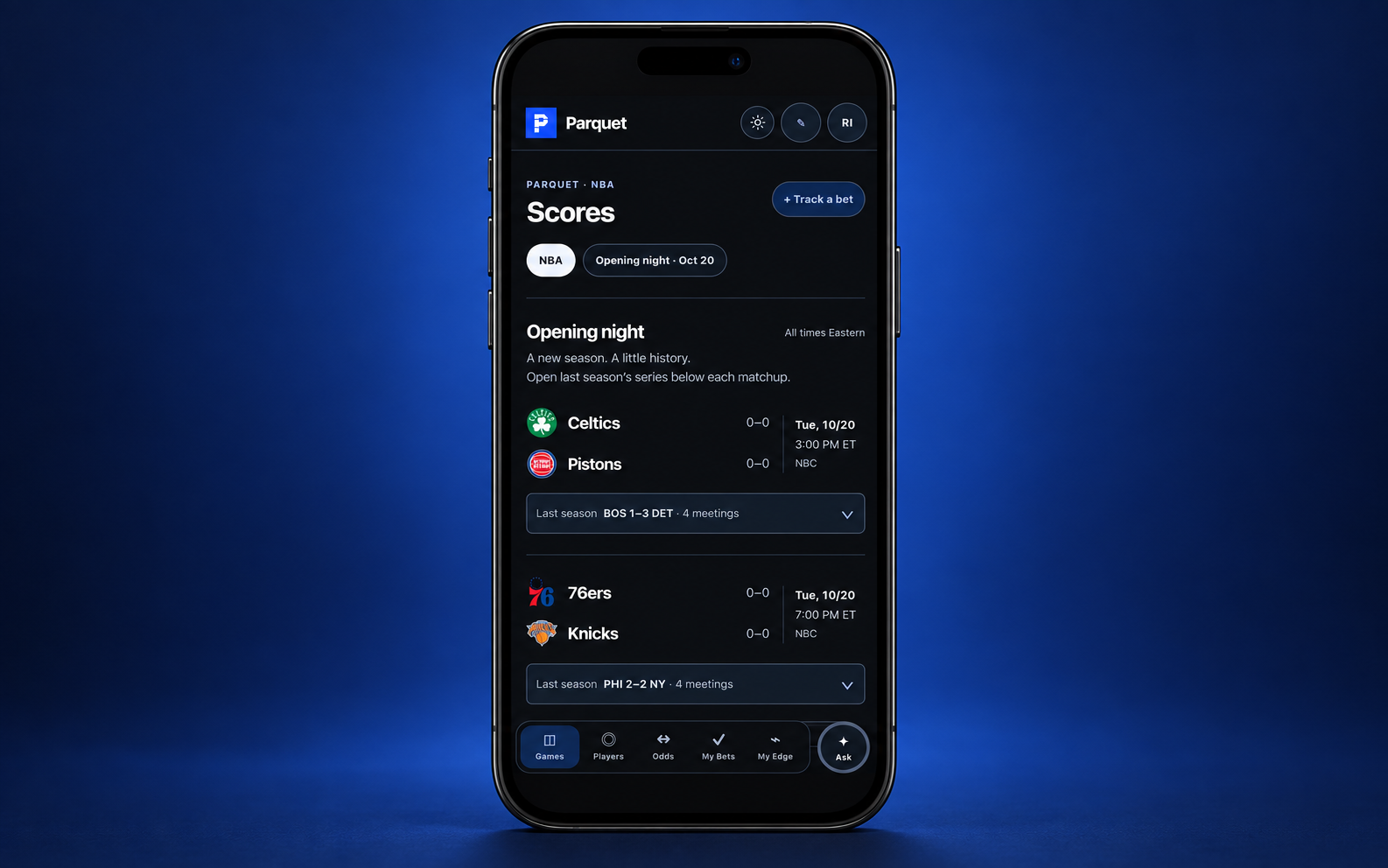 Parquet on an iPhone showing the dark-mode Scores screen with NBA opening-night matchups